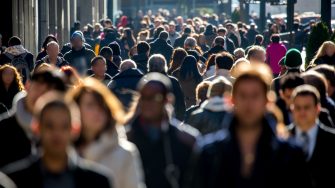 A crowd of people walking