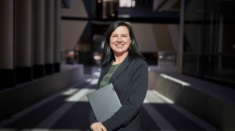 Law student portrait with building exterior and building shadows