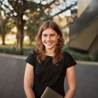 Law student portrait outside, in front of Law Building