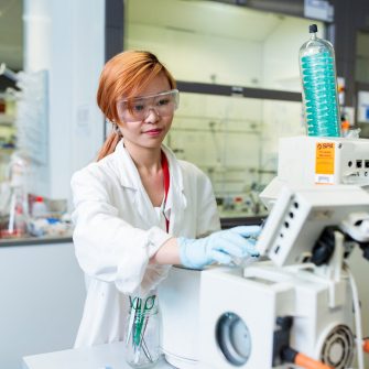 Student working with laboratory equipment