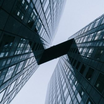 Dark squiggle connecting two buildings