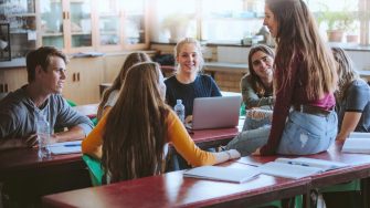 Group of students in classroom talking