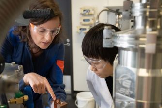 Material scientists in lab looking at materials