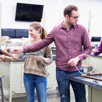 Team of Engineering Students at University Science Lab preparing for their project work