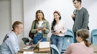 Students working together at a desk