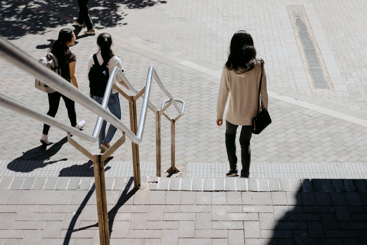 Students walking down UNSW staircase